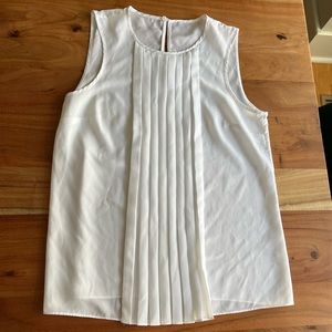 White Sleeveless Blouse with Ruffle Detail